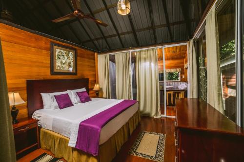 Postel nebo postele na pokoji v ubytování KikiWitz Resort