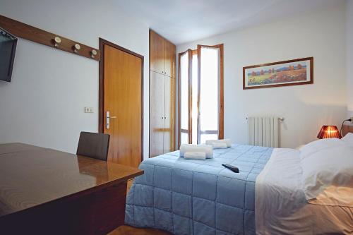 Postel nebo postele na pokoji v ubytování Albergo Romagna