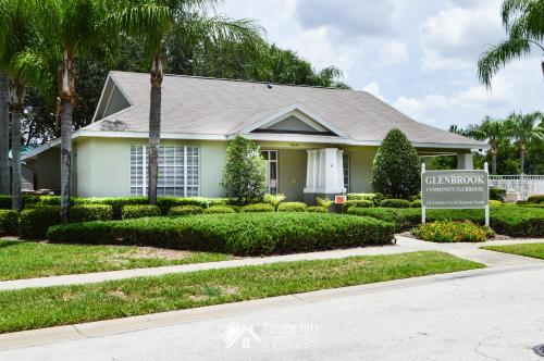 a house with a sign in front of it at Affordable Luxury Home Near Walt Disney World - Sunshine Villa at Glenbrook Resort, Orlando, Florida in Orlando