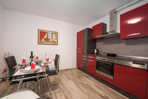 Kuchyň nebo kuchyňský kout v ubytování Apartman Vita
