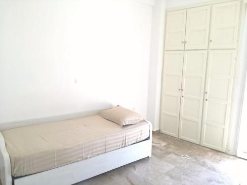 Ένα ή περισσότερα κρεβάτια σε δωμάτιο στο Central flat, 300m from the beach