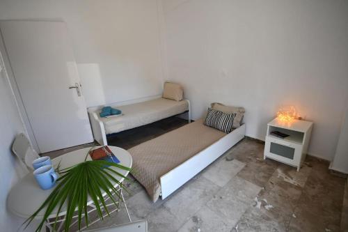 Ένα ή περισσότερα κρεβάτια σε δωμάτιο στο Central flat, 300m from the beach