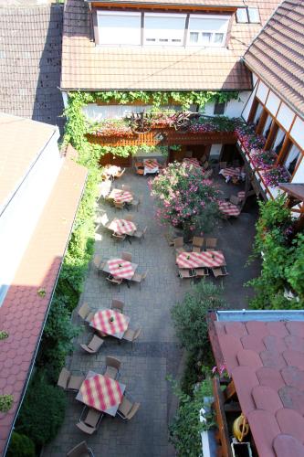 an overhead view of a patio with tables and chairs at Weinhotel / Gasthaus zur Sonne in Ihringen