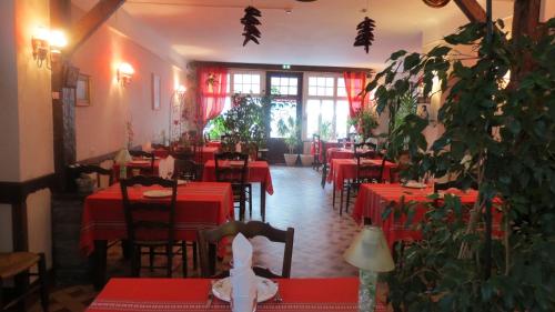 Un restaurant sau alt loc unde se poate mânca la Hotel Au Petit Béarn