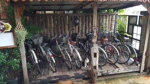 a row of bikes parked next to each other at Saikaew Resort in Chiang Rai