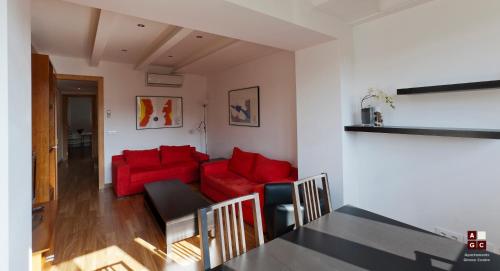 Coin salon dans l'établissement Apartaments Girona Centre