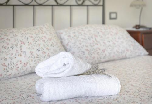 Een bed of bedden in een kamer bij Relais Masseria Casiello