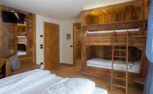 Sport Hotel Rudolfにあるベッド