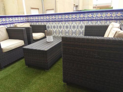A seating area at Fantastico Apartamento con solárium