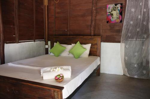 
A bed or beds in a room at Sun Wind Beach Kalpitiya Kite Resort
