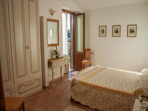 Ένα ή περισσότερα κρεβάτια σε δωμάτιο στο San Fedele Alloggi
