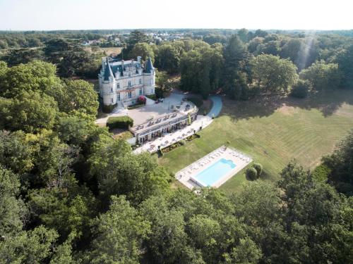 an aerial view of an estate with a swimming pool at Domaine de la Tortinière in Montbazon