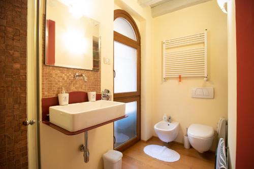 Ett badrum på Lovely Apartment Sottoriva