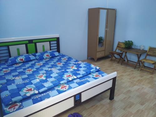 Katil atau katil-katil dalam bilik di Mecong Homestay