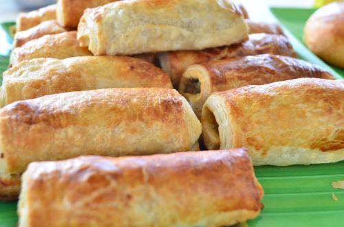 a pile of pastries sitting on a green plate at Yensfield Blackpool in Nuwara Eliya