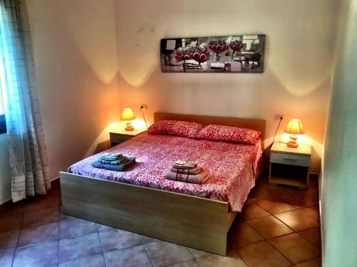 Ένα ή περισσότερα κρεβάτια σε δωμάτιο στο MP Guest House