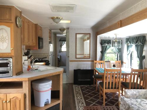 A kitchen or kitchenette at Garden Bay Hideaway - Glamping
