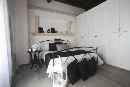 Postel nebo postele na pokoji v ubytování Torre Elisa - Luxury Room