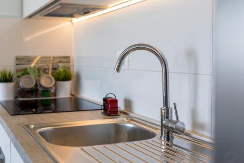 Kuchyňa alebo kuchynka v ubytovaní Apartment StellaMare