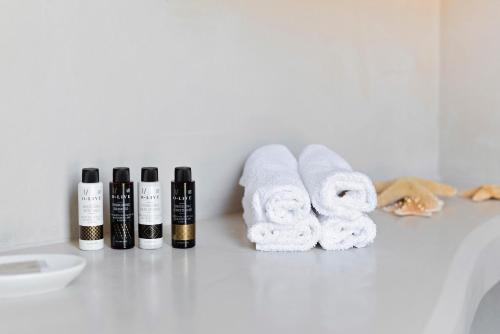 a group of towels and products on a counter at Ta Spitakia in Kos Town