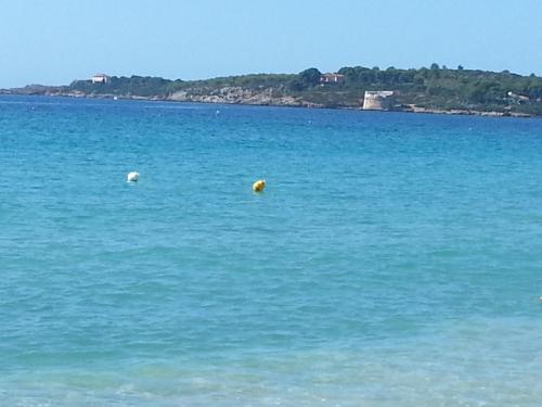 a large body of water with two balls in it at Rosanna House in Bombarde Beach in Alghero