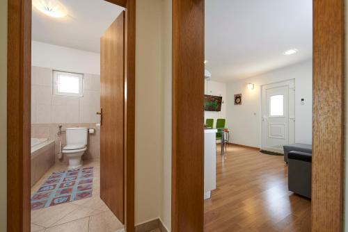Kúpeľňa v ubytovaní Apartment Ugrina