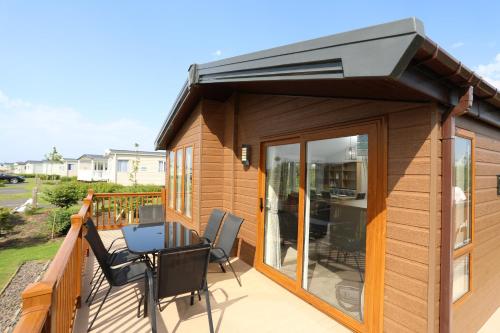 Balkón nebo terasa v ubytování Cosy Dreams Lodge