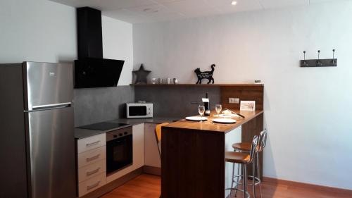 Kuchyň nebo kuchyňský kout v ubytování Apartamentos CAN GUSI