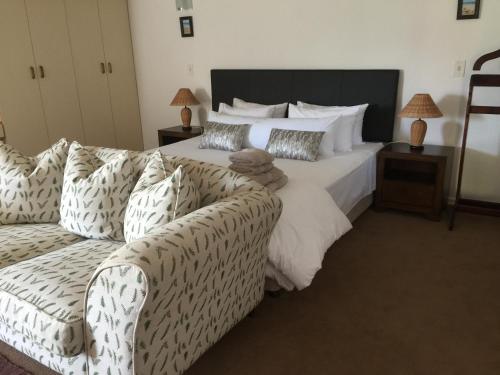 Кровать или кровати в номере Vue Port