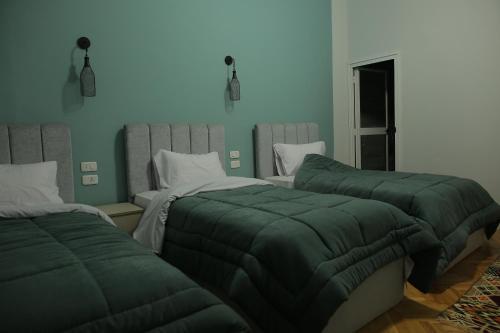 Posteľ alebo postele v izbe v ubytovaní Cheers Hostel