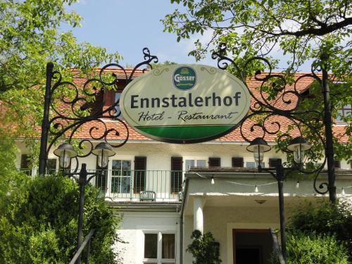 a sign for aninstallation high restaurant on a building at Ennstalerhof in Grossraming