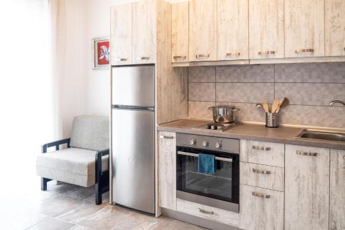Una cocina o kitchenette en Katerina's Luxury Apartments