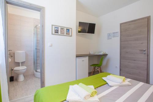 Kúpeľňa v ubytovaní Room Elelina