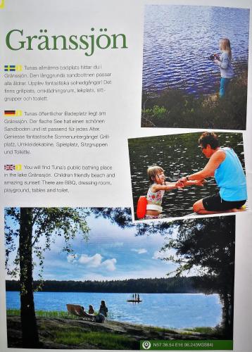 a page of a magazine with a picture of a woman and a child playing in at Vimmerby Lilla utsikten in Tuna