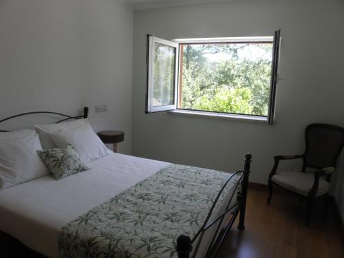 Giường trong phòng chung tại Quinta Mata da Sé
