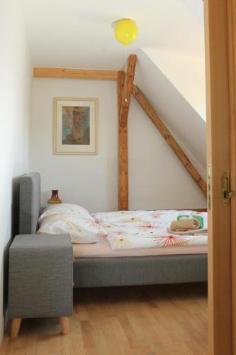 a bedroom with a bed in a room at Apartmán Nella in Valtice