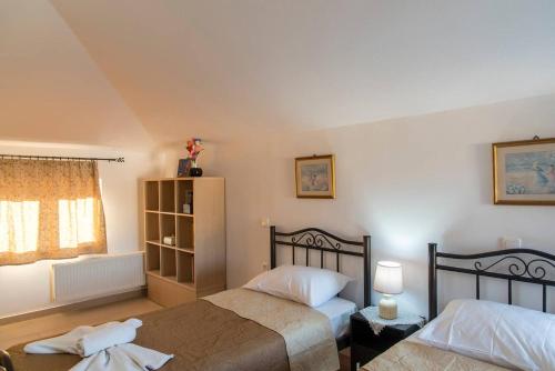Postel nebo postele na pokoji v ubytování Cosy House