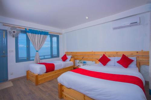 Postel nebo postele na pokoji v ubytování Mount Princess Hotel
