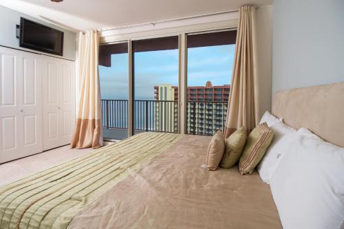 En eller flere senge i et værelse på Shores of Panama Resort