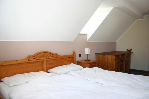 Una cama o camas en una habitación de Quartier78