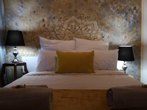 Postel nebo postele na pokoji v ubytování Boh- House
