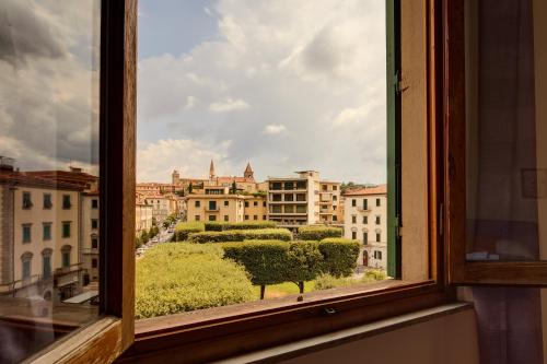 a view of a city from a window at Sette Note Guest House in Arezzo