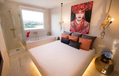 Postel nebo postele na pokoji v ubytování LOFT PLAYA SALINAS CALPE, Grupo Terra de Mar, alojamientos con encanto