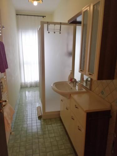 a bathroom with a sink and a mirror at casa bijoux in Itri