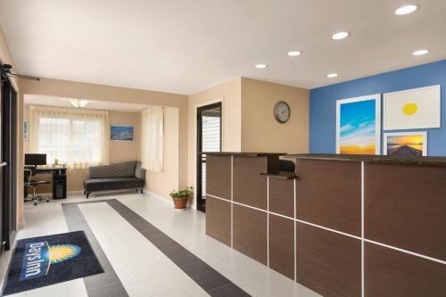 an office with a reception desk and a waiting room at Days Inn by Wyndham Middletown/Newport Area in Middletown