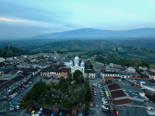 an aerial view of a town with a clock tower at Vivienda Turistica Yerbabuena in Filandia