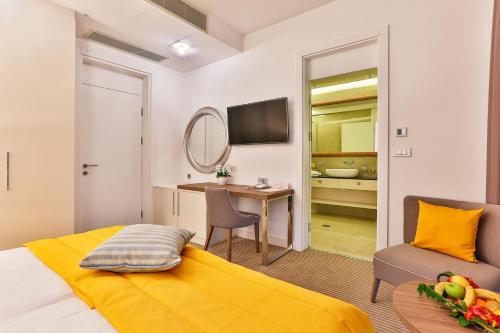 Krevet ili kreveti u jedinici u objektu Hotel Rivijera