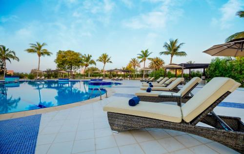 Hamdan Plaza Hotel Salalah, an HTG Hotel tesisinde veya buraya yakın yüzme havuzu