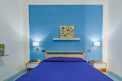 Postel nebo postele na pokoji v ubytování Lumia Case Vacanze