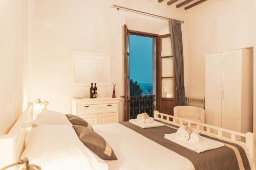 En eller flere senge i et værelse på Albergo Giardino